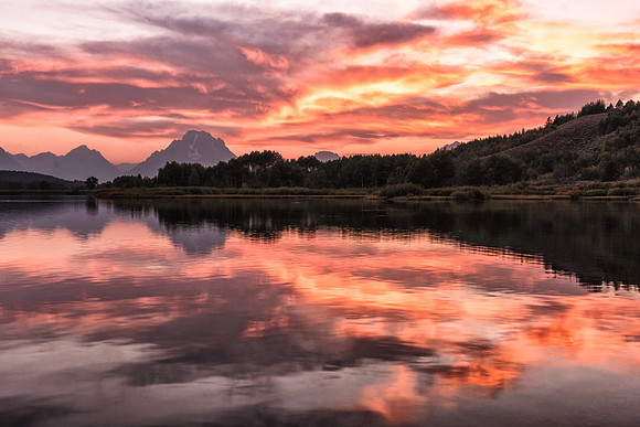 20180908-JAH02581:  Firey sunset over Oxbow Bend in Grand Teton National Park.