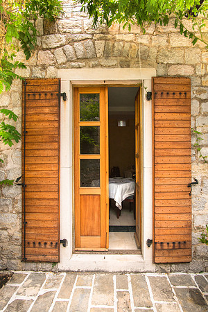 20180725-JAH00709: A dining table awaits you near the Citadela in Old Town Budva, Montenegro.