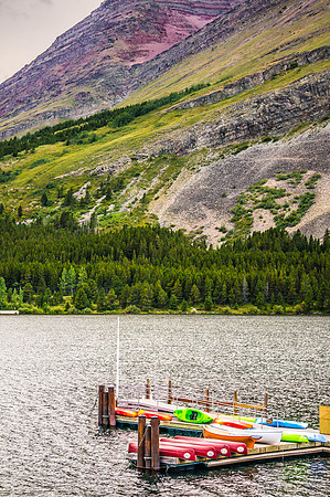 20140902-DSC5008: Watercraft resting in Swiftcurrent Lake in Glacier National Park, Montana.
