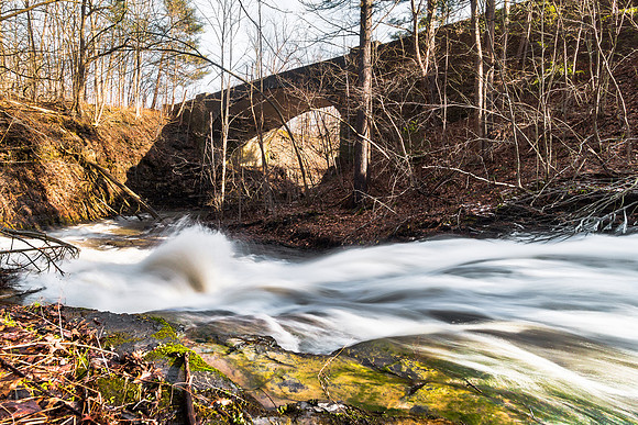 20190104-JAH06000: Sawmill Chute flows under this bridge in Letchworth State Park, New York.