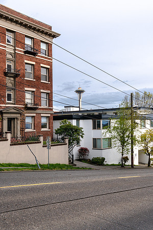 20190415-JAH06901: The Space Needle protrudes from a view along steep Queen Anne Ave in Seattle.