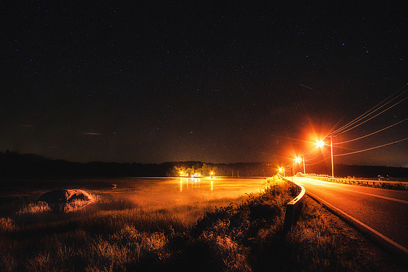 20190829-JAH09248: Street lights glow over Lake Abanakee near Indian lake, Adirondacks NY.