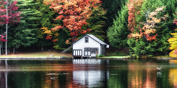 20201003-JAH09727: Boat House in the Fall on Seventh Lake, Inlet NY. (2x1 wide)